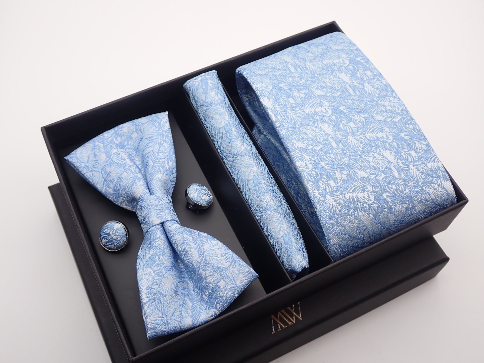 Refreshing sky blue necktie with a delicate white floral garden pattern, perfect for summer weddings.
