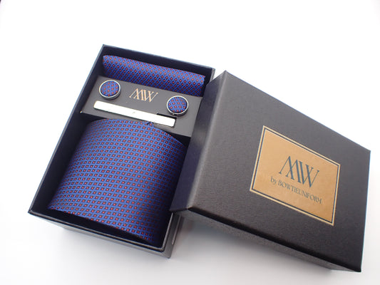 A black gift box containing a navy blue tie with small red grid checkered patterns, matching pocket square, cufflinks, and a silver tie clip.