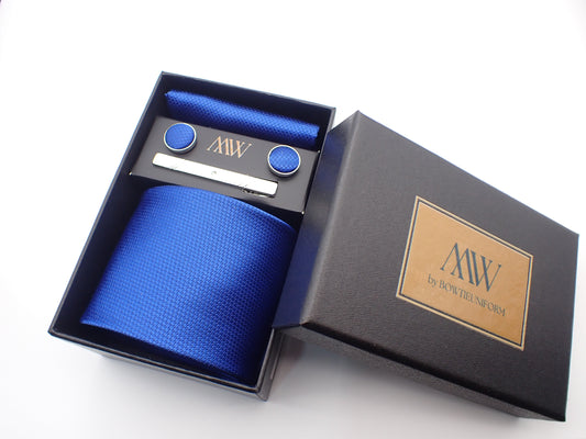 A classic royal blue micro-woven men's necktie, matching pocket square, cufflinks, and a silver tie clip neatly packed in a black gift box.